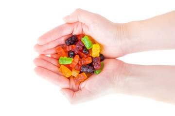 Gummy bear candies in female hands