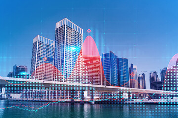 Skyscrapers of Dubai business downtown. International hub of trading and financial services of Western Asia. FOREX graph and chart concept. Double exposure. Dubai Canal waterfront.