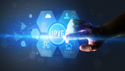 Hand touching IPV6 inscription, new technology concept