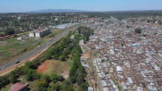 Aerial view over Kibera rusted metal rooftops, largest slum in Africa