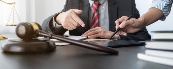 Professional lawyer team considering with contract legal in courtroom. Justice, Law, Attorney and...