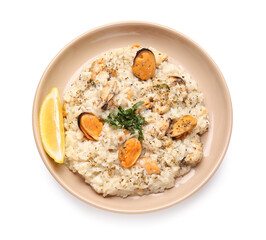 Plate with tasty risotto on white background