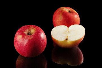 Red apples on a black background