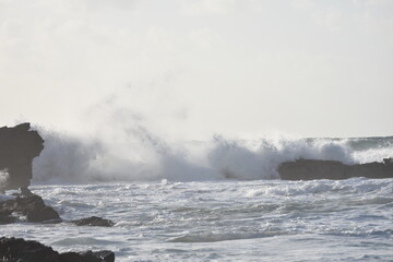 Watching the waves from the cliff