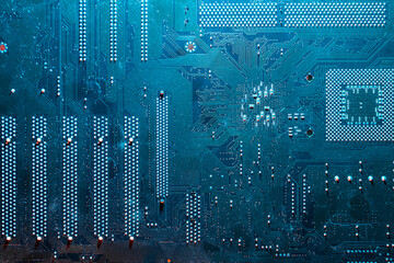Electronic blue circuit board, computer microcircuit top view, selective focus. The concept of...