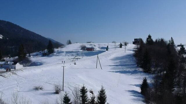 Photographed from a drone at Synevir Pass in winter. Coniferous forest. Carpathian mountains. Ukraine.