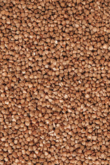 Buckwheat as a background texture. Top view. Copy, empty space for text