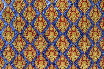 Thai art on wall pattern in Thai temple for background.