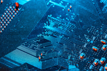 Electronic blue circuit board, computer microcircuit top view, selective focus. The concept of...