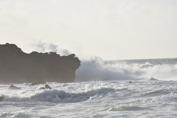 Watching the waves from the cliff