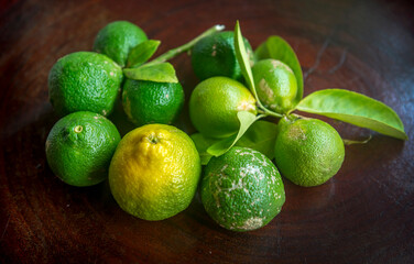 Fresh green eco Lime fruits with green leaf.