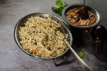 Bagara Baingan served with Bghare Rice - Hyderabadi Eggplant Curry