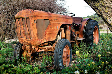 old and rust farm tractor machine abandoned