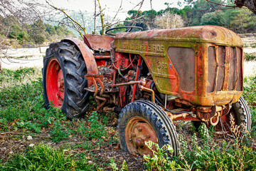 old and rust farm tractor machine abandoned