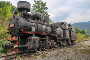 Obraz na płótnie Canvas Old and rust steam abandoned train