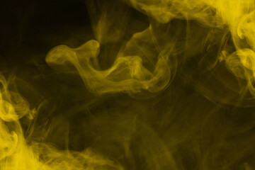 Yellow steam on a black background.