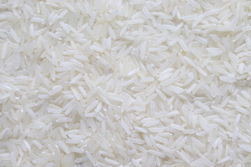 The texture of rice cereals. White background with rice. Jasmine, risotto, basmati.