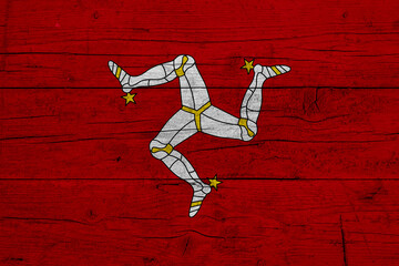 Flag of Isle of Man. Wooden texture of the flag of Isle of Man