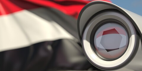 National flag of Yemen and CCTV camera. Surveillance system conceptual 3D rendering