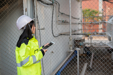 Engineers work place to keep liquid helium,preventive maintenance schedule checking,Thailand people