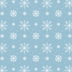 Blue snowflakes pattern. White snowflakes pattern on blue background