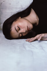 Sick woman with unconscious feeling faint lay down on floor with fever and insensitivity Young...