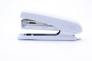 White stapler isolated on white background use for advertising new stapler product and stationary.