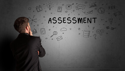 businessman drawing a creative idea sketch with ASSESSMENT inscription, business strategy concept