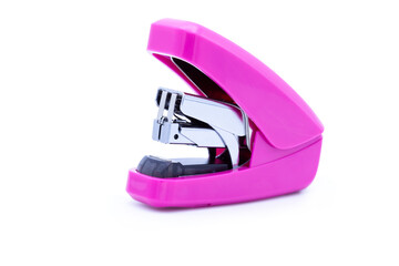 Small pink stapler isolated on white background with clipping path use for advertising new stapler...