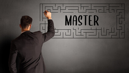 businessman drawing maze with MASTER inscription, business education concept