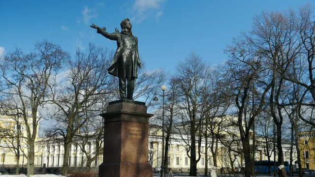 St. Petersburg, Russia, March 2, 2021 Alexander Pushkin Russian poet monument, attractions of St. Petersburg, panorama time lapse   