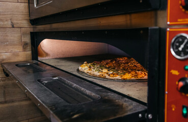 Appetizing pizza in the oven