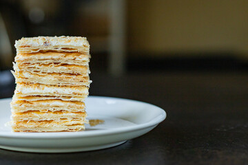 cake napoleon puff cake dessert sweet Takeaway snack healthy meal top view copy space for text food...