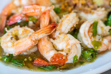 stir fried shrimp with thai chili and basil.