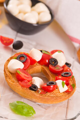 Friselle with tomatoes and mozzarella cheese.