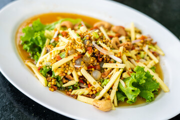 Thai spicy three type of roes salad, popular thai seafood dish