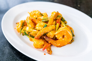 Stir fried shrimp with salt eggs sauce.