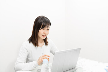 Woman working on a laptop PC