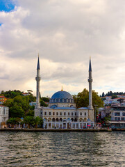 Fototapeta na wymiar A view of Beylerbeyi Mosque, also known as Hamid-i Evvel Mosque, from the Bosporus in Istanbul, Turkey.