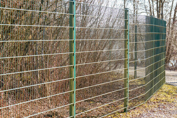 Handmade fence in Bavaria photographed with a telephoto lens