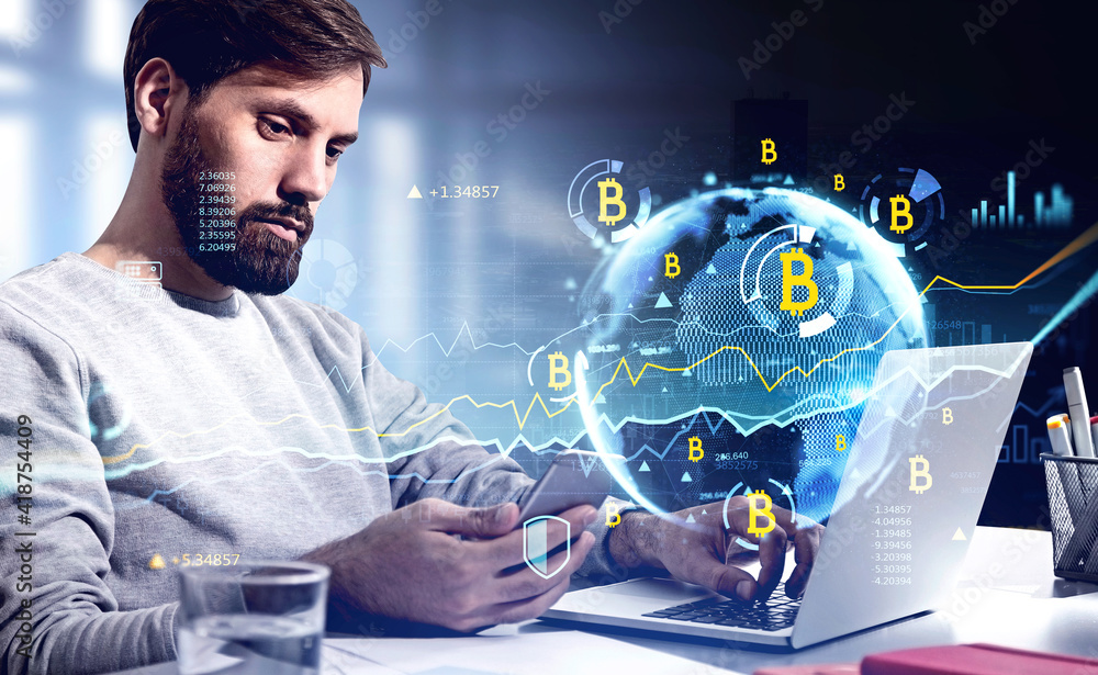 Poster handsome beard trader analyzing cryptocurrency rates, side view businessman working on laptop. doubl