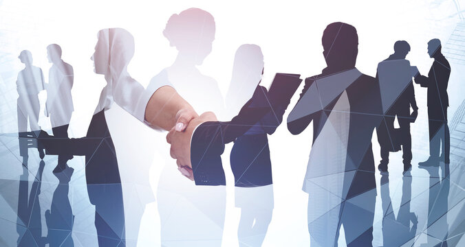 Handshake Of Businessman And Businesswoman In Formal Clothes. Silhouettes Of Business People. Corporate Culture Concept And Deal Transaction. Colleagues Are On Background. Double Exposure.