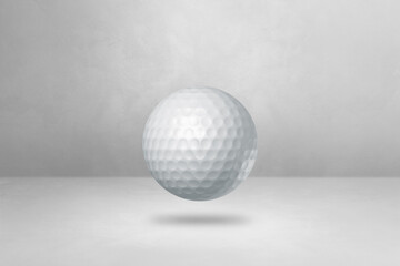 White golf ball on a blank studio background