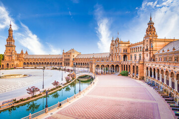 Naklejka premium Spain Square in Seville, Spain. A great example of Iberian Renaissance architecture during a summer day with blue sky