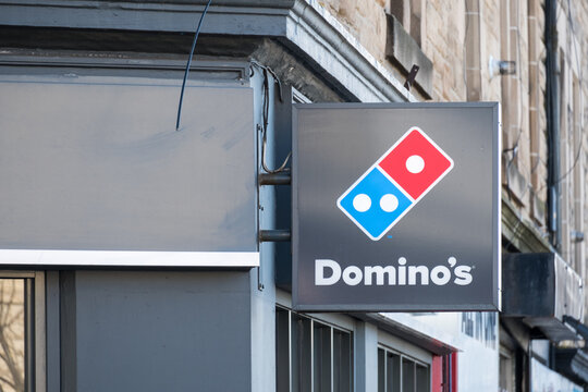 Edinburgh, United Kingdom. 17 March 2017 : Domino Pizza, Logo from exterior shop. It is an American pizza restaurant chain.