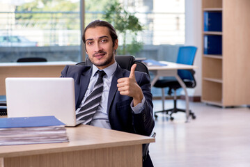 Young businessman employee working in the office