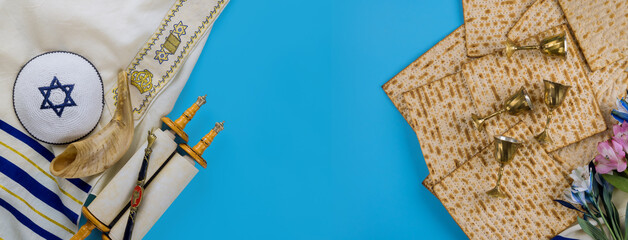 Passover matzoh jewish holiday bread, four cup kosher wine on Jewish pesach attributes in composition