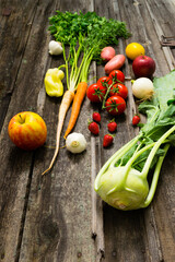 fresh fruits and vegetables on old weathered wooden