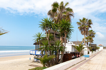 Fototapeta na wymiar Chiringuito on the beach of Matalascañas, on the promenade