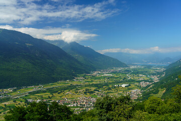 Naklejka na ściany i meble Panoramic view of Valtellina from Mello at summer